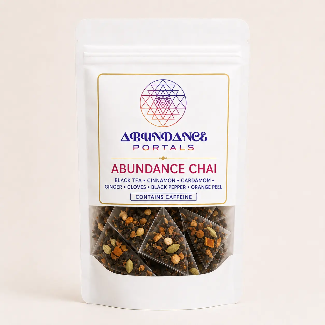 Abundance Chai pouch with visible botanical ingredients and pyramid tea sachets